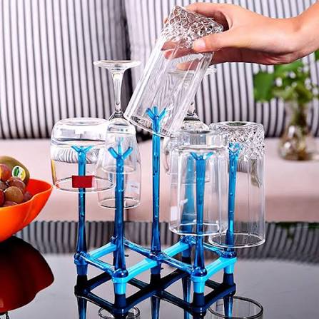 Modular 6-slot blue glass drying rack holding wine glasses and tumblers upside down